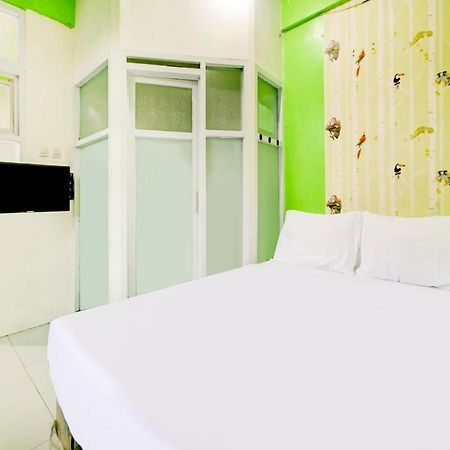 Oyo Life 3103 Opo Homestay & Kost Malang Bagian luar foto