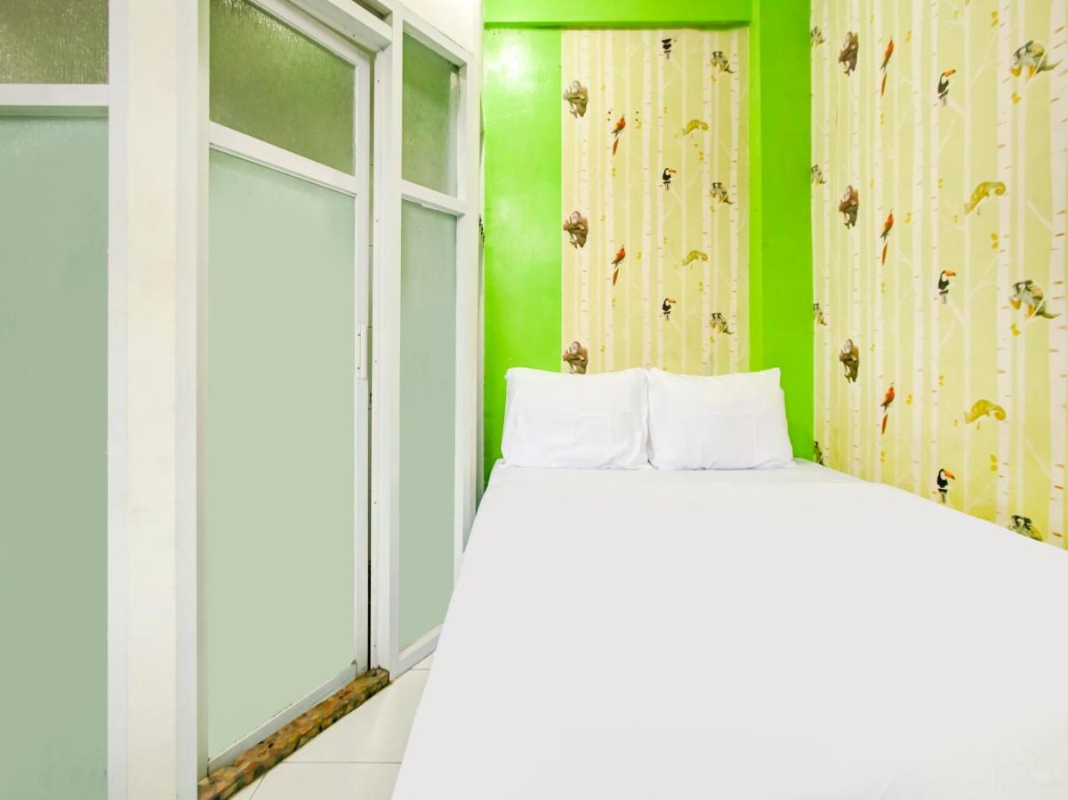 Oyo Life 3103 Opo Homestay & Kost Malang Bagian luar foto